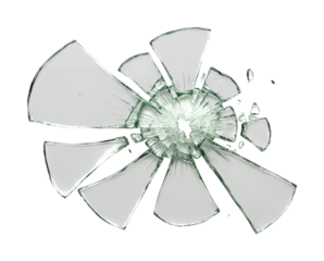 Broken glass fragments with a central hole and radiating lines, showcasing the destructive power of an impact and the delicate nature of the material.