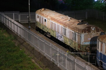 an old, rusting, decommissioned train