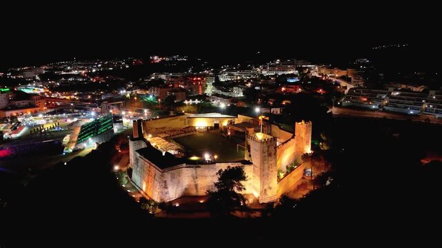 Aerial view of city lights in Spain at night.
