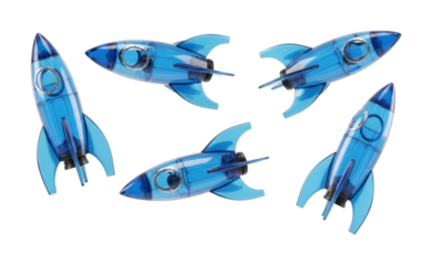 Blue transparent rockets in various orientations, representing concepts of launch, progress, and achievement with a futuristic and playful aesthetic.