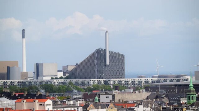 Cityscape showing rooftops and the modern power plant building in Copenhagen, Denmark