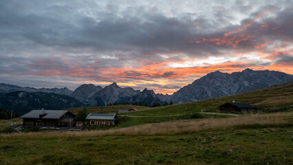 sunset at Gotzenalm mountain hut with Mt. Watzmann, Berchtesgaden national park, Bavaria, Germany