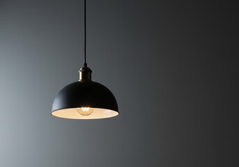 A simple, unlit pendant light fixture hangs from the ceiling, emphasizing minimalist interior design and modern electric lighting concepts, decor, background, wire