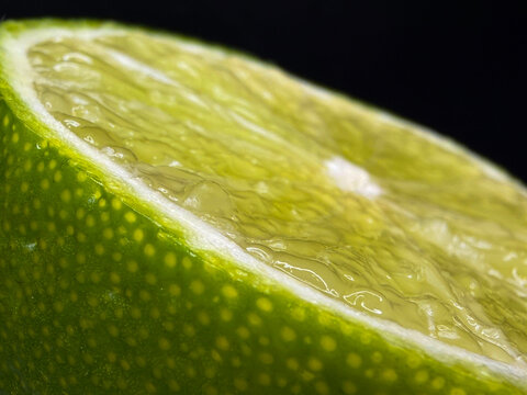 Macro Close-Up of Lime Peel and Citrus Flesh - Fresh Green Fruit Texture