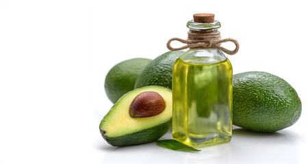 Bottle of avocado oil with fresh avocado fruit isolated on white background photographed in studio during daytime for healthy cooking education clean eating promotion wellness branding
