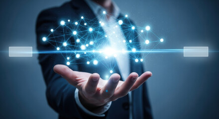A businessman in a suit holds a glowing network connection in his hand, symbolizing data transfer and digital technology against a dark blue backdrop.