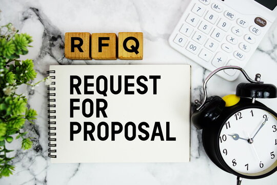 RFQ Request For Quotation text with calculator and alarm clock on marble background