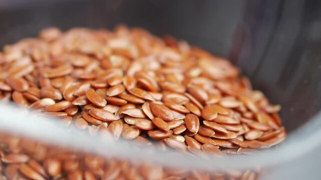 Pile of flaxseeds in a small bowl 