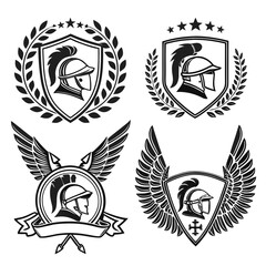 Obraz premium elegant laurel wreaths, shields, wings, and ribbon vector set.black-and-white vector pack of wreaths, shields, banners, and wings .Collection of six heraldic emblems with shields laurels helmet.