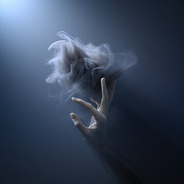 Gracile hand reaching into swirling mysterious smoke with a soft light