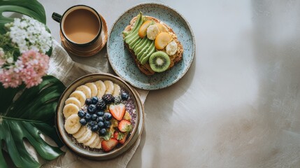 Healthy lifestyle breakfast flatlay with avocado toast, smoothie bowl, fresh fruits, minimal clean top view, wellness branding concept - copy space 