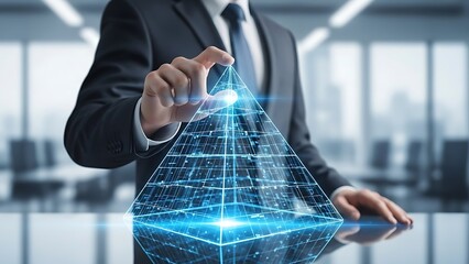 Businessman interacting with 3 D digital pyramid on table in office suit hand finger