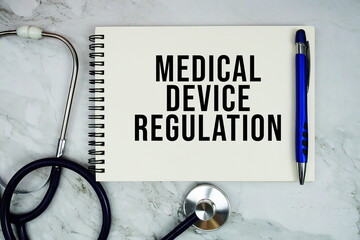 Medical Device Regulation text written on notepad with stethoscope on marble background