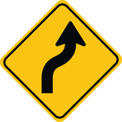 Yellow diamond road sign with black wavy arrow pointing up and right traffic sign warning sign © Aklima