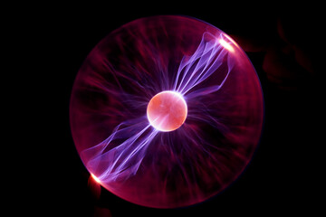 Plasma Ball with human hand causing plasma flow to jump to fingers creating unique patterns and textures