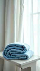 white towel on the window sill