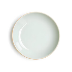 A white plate with a blue rim sits on a white background