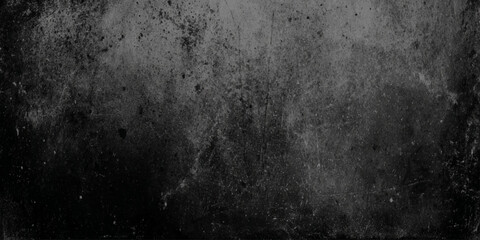 Obraz premium A dark grainy texture dominates the image presenting a mottled surface with subtle variations in tone and light