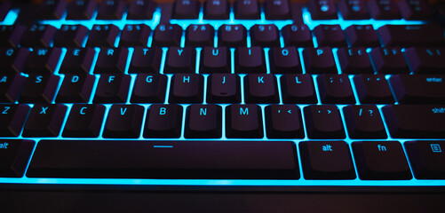 Backlit Gaming Keyboard with Cyan Blue LED Light Close-up