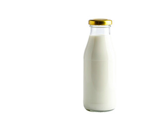 A clear glass bottle of creamy white liquid with a golden cap, isolated on black background