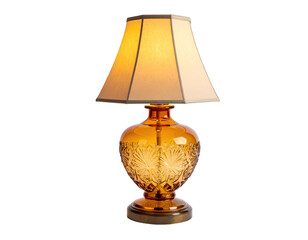 A classic, illuminated lamp with an amber glass base and tan lampshade against a black background