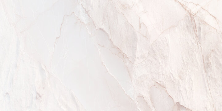 A close up view of a creamy white marble texture with subtle veining patterns and a polished surface