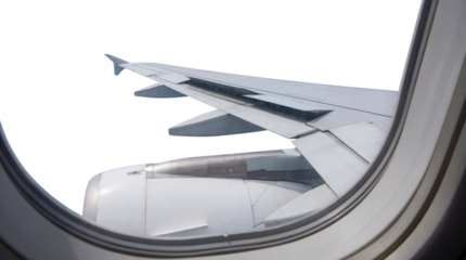 View from airplane window showing wing and jet engine during flight on transparent background