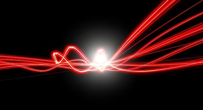 Abstract red light trails swirling around a bright white light source on a dark background, representing speed and energy