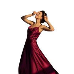 Elegant Woman Dancing in Red Satin Dress with Joyful Expression