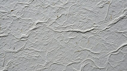Gray textured surface with rough, organic pattern