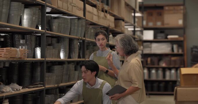 In a family business, a mother, son, and daughter manage a ceramic shop together, arranging tableware displays and coordinating daily operations for both retail and wholesale sales.
