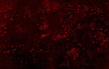 Abstract paint splatter texture on dark surface