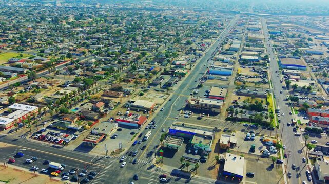 Aerial view of Calexico main street featuring buildings, roads, and everyday city life from above.