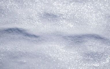 Obraz premium White field under snow. Frosty winter landscape with frozen snow. Snow texture for winter background. Snow -covered field. Winter cold pattern. Icy frozen background.