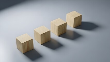 Fototapeta premium Four wooden blocks of varying heights casting shadows on a grey surface