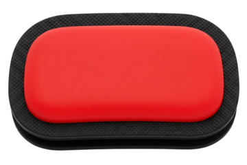 Red gel wrist rest pad with black non-slip rubber base isolated on a transparent background