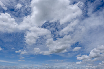 clear blue sky background,clouds with background, Blue sky background with tiny clouds. White fluffy clouds in the blue sky. 
Captivating stock photo featuring the mesmerizing beauty of the sky 