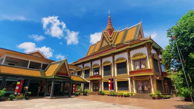 SIEMREAP, CAMBODIA - October 6, 2025: The interior of Wat Preah Prom Rath Temple. A Buddhist temple with statues of cows. A decorative structure made of gold. The main spiritual center of Siemreap. 4К