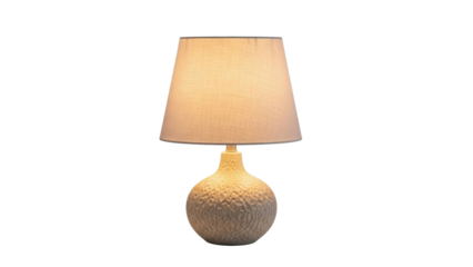 Modern table lamp with textured ceramic base and fabric shade glowing, cut out, stock png, isolated on transparent background
