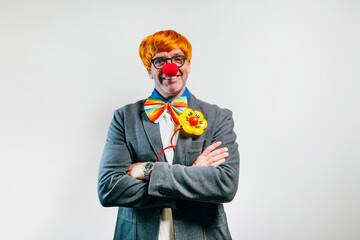 Businessman enjoying being a cheerful clown in costume