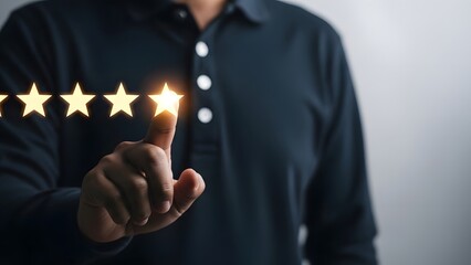 Person's hand reaches out to touch the fifth glowing star in a row, symbolizing excellent service.