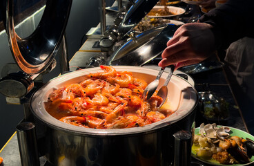 scooping the food, catering, dinner time