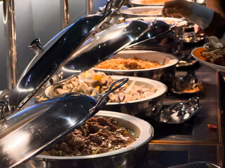 scooping the food, catering, dinner time