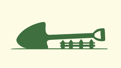 Green silhouette of a garden shovel lying on the ground next to a small wooden fence