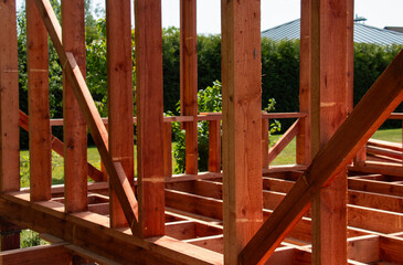 Wooden structure, wooden beams. Wooden rafters. new building