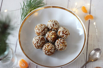 Sweet sesame balls in a saucer on the table