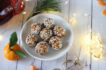 Sweet sesame balls in a saucer on the table
