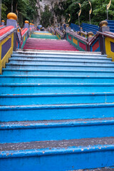 Steps of Batu Caves, a famous shrine and limestone hill complex, known for its stunning cave temples and the giant stature of Lord Murugan near Kuala Lumpur, Malaysia