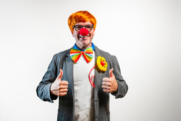 Adult man dressed as clown with thumbs up gesture