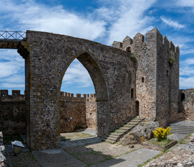 Historic stone castle with archway and towers